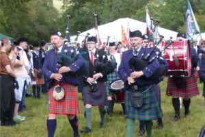 Bagpipe procession at the Glenisla Highland Games