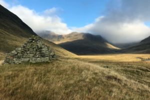 Bessie's Cairn and the high mountains at the top of Glenisla